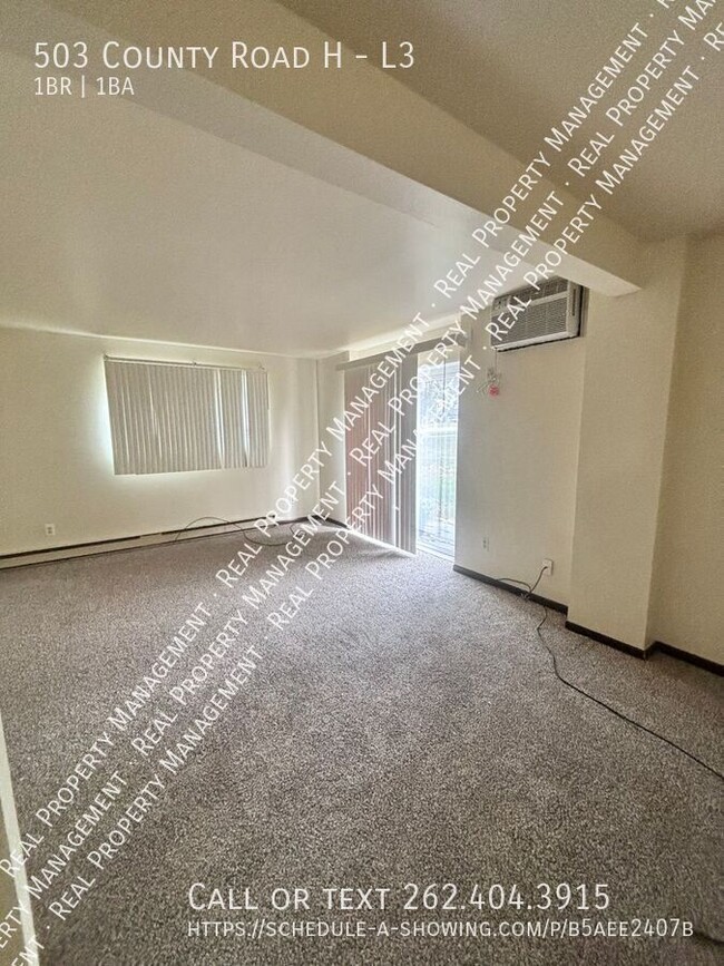 Building Photo - Lower 1 Bedroom Apartment @ Creekside Apar...