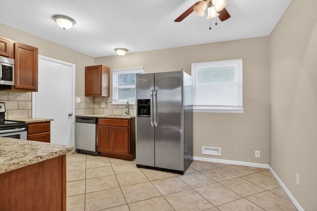 Building Photo - Unbeatable Prairie Village Location - 3BR/1BA Home, Fully Fenced Yard, Laundry Hook Ups, Attached...