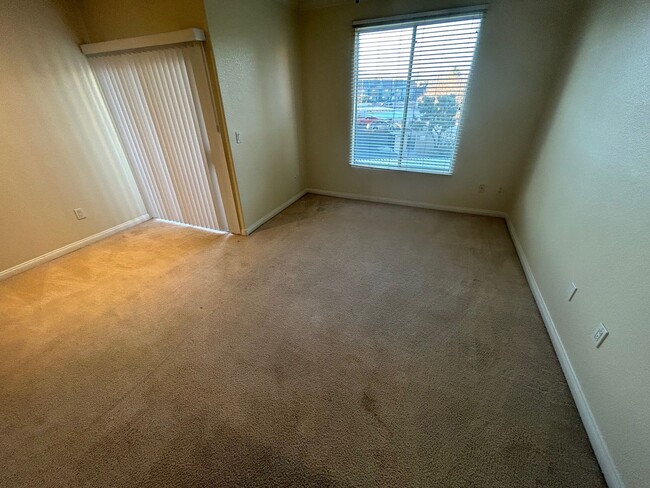 Building Photo - ADORABLE 2 BEDROOM 2 BATHROOM CONDO LOCATED IN A GATED COMMUNITY