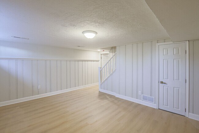 Building Photo - RENOVATED PARKVILLE TOWNHOME 3BR 1.5BA