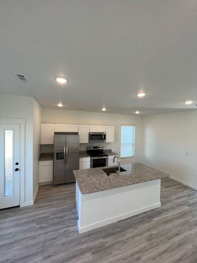 Building Photo - LEASING SPECIAL! 1/2 OFF FIRST MONTHS RENT - Featherston Village - Modern Living - 2 Bedroom/2.5 ...