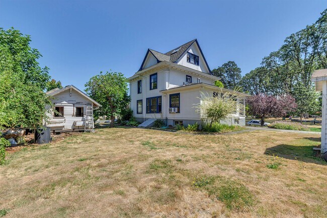 Building Photo - Historic Elegance Meets Modern Comfort – Beautifully Restored 1904 Victorian in the Heart of Fore...