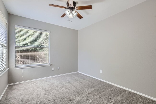Building Photo - Charming 3/2/2 with Private Fenced Backyard!
