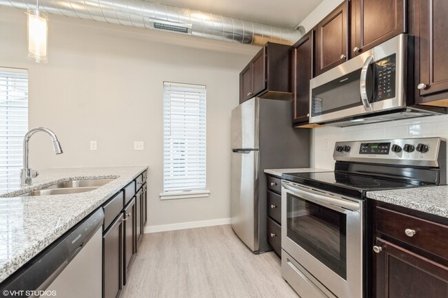 Building Photo - Villas at The Hub | Modern 3 Bedroom Townhome Garage & Private Entry