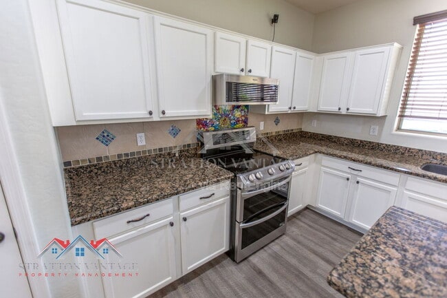 Building Photo - 14099 W Riviera Dr