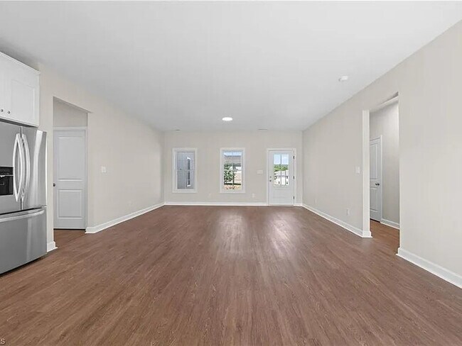 Building Photo - Earn Wealth While Leasing - Like a Homeown...