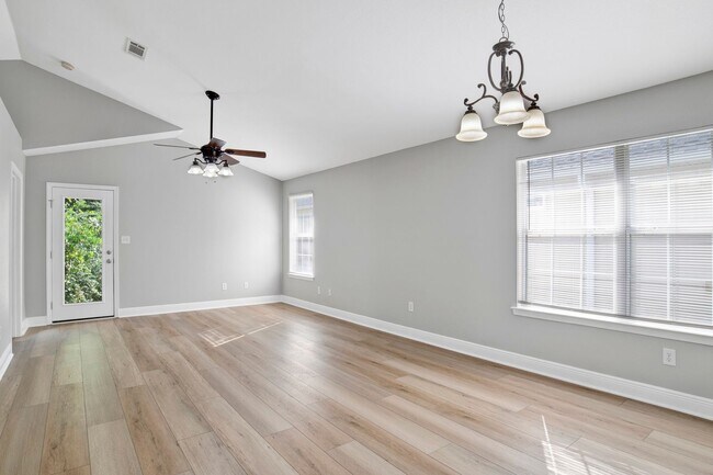 Building Photo - Modern Home Tucked in Neighborhood less th...