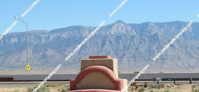 Building Photo - Custom 3 Bedroom, 2 Bathrooms, 2 Car Garage and 2,212 Sq Ft. Home with Beautiful Sandia Mountain ...