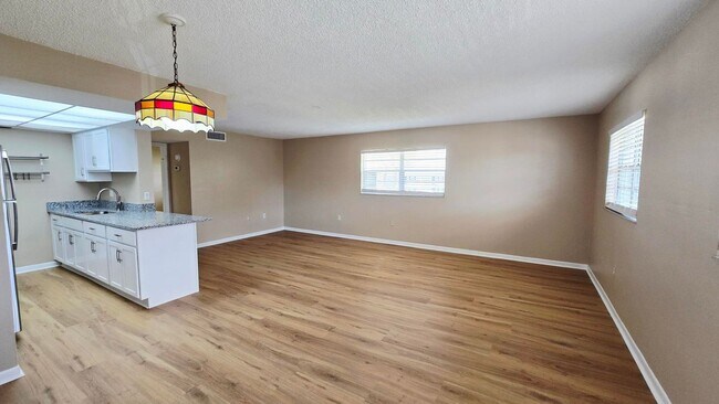 Building Photo - Annual Updated 1BR/1BA Condo – New Interior Finishes, Located on the 2nd Floor