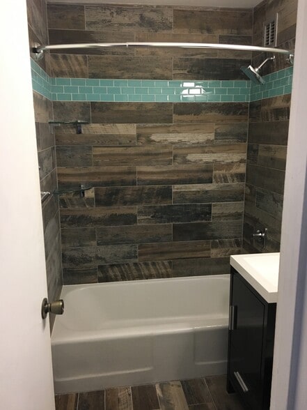 clean new tile throughout bath - 1121 Arlington Blvd