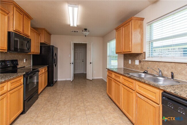 Building Photo - 6501 Alvin Dr