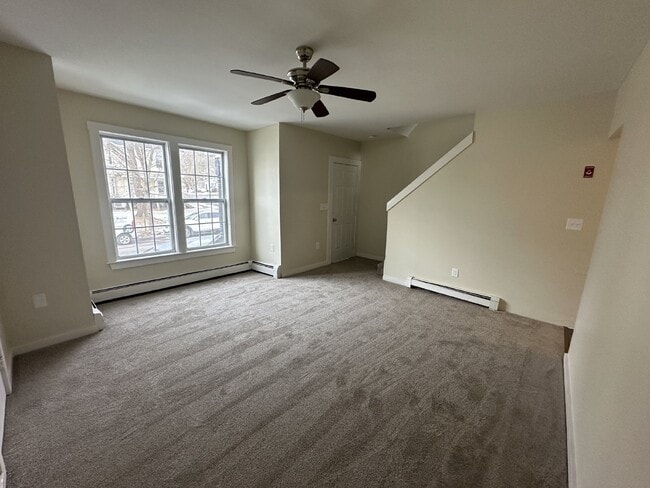 Building Photo - Recently Updated 3BR Townhouse | 2 Parking Spots | Prime Dover Location | $2,300/mo