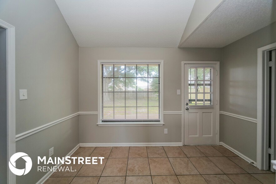Building Photo - 6740 Stewart Forest Cove E