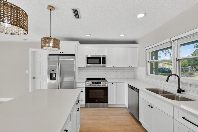 Building Photo - Fully Remodeled 3BR Home with Large Fenced Yard & New Deck