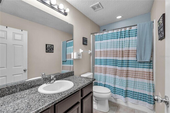 Building Photo - 7085 Woodchase Glen Dr