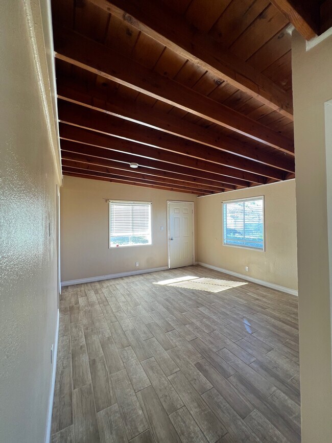 Building Photo - 9529 E Ave T 12