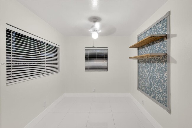 Building Photo - 5655 NE 5th Terrace