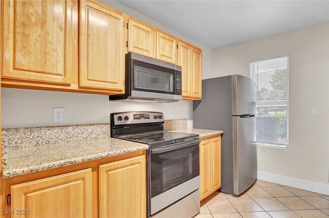 Building Photo - 5055 W Hacienda Ave