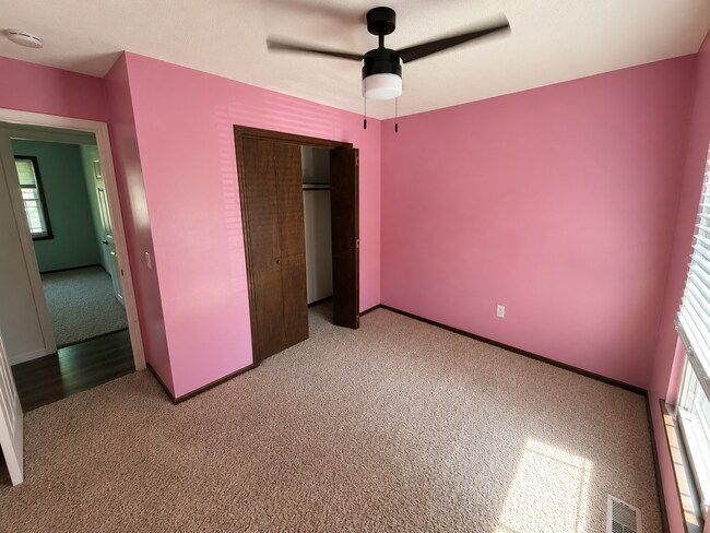 Building Photo - Spacious West Manhattan Home with Modern Updates, Oversized Garage & Prime Location