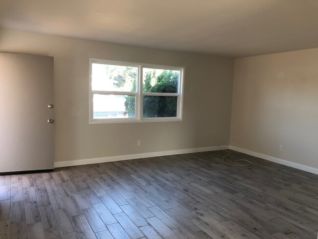 Building Photo - Live 3 Blocks Away From The Ocean!!