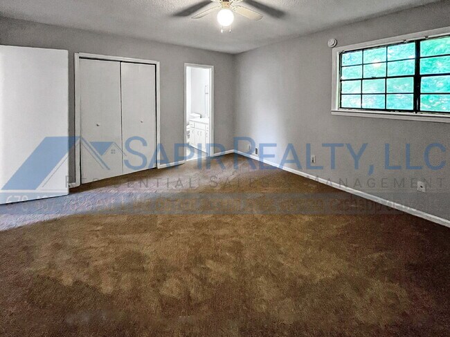 Building Photo - Move in before January 15th and choose your reward: a $250 Amazon Gift Card or a 55" Smart TV!