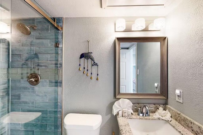 Walk in shower in full bath room - 6102 Seawall Blvd