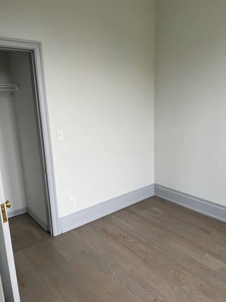 Bedroom closet (one in each bedroom). - 2057 W Chicago Ave