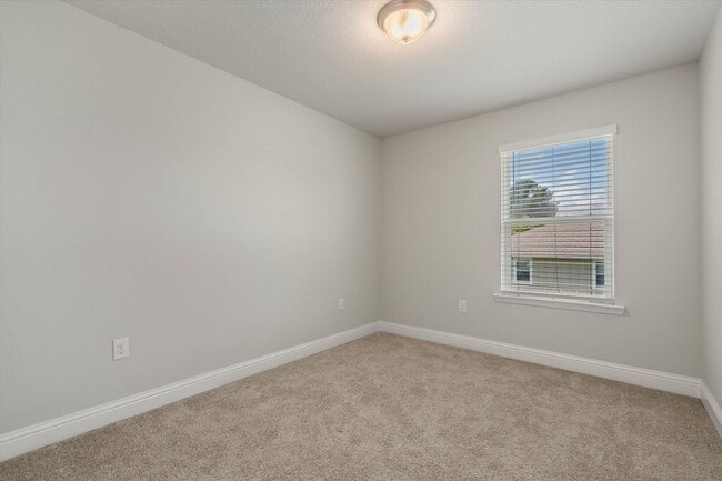 Building Photo - HEART OF DAPHNE TOWNHOUSE WITH GARAGE
