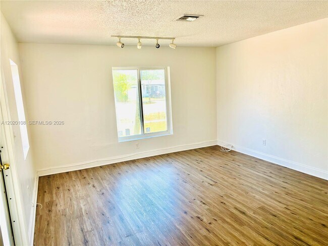 Building Photo - 9820 Caribbean Blvd