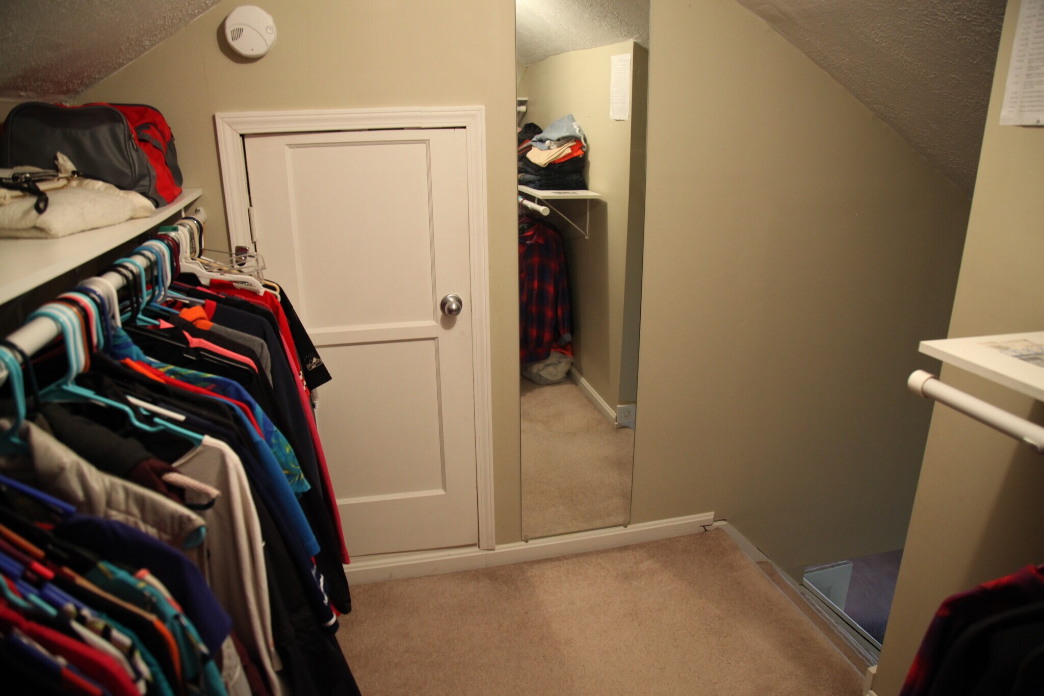 Bedroom 1 - walk-in closet and attic (storage) door - 2411 Fortune Avenue