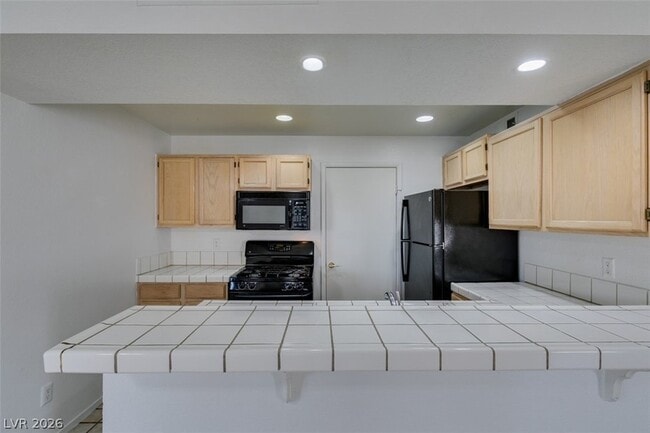 Building Photo - 7570 W Flamingo Rd
