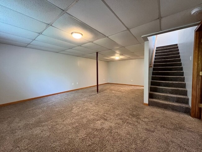 Building Photo - Spacious 3BR Duplex with Finished Basement & 2-Car Garage in Otsego