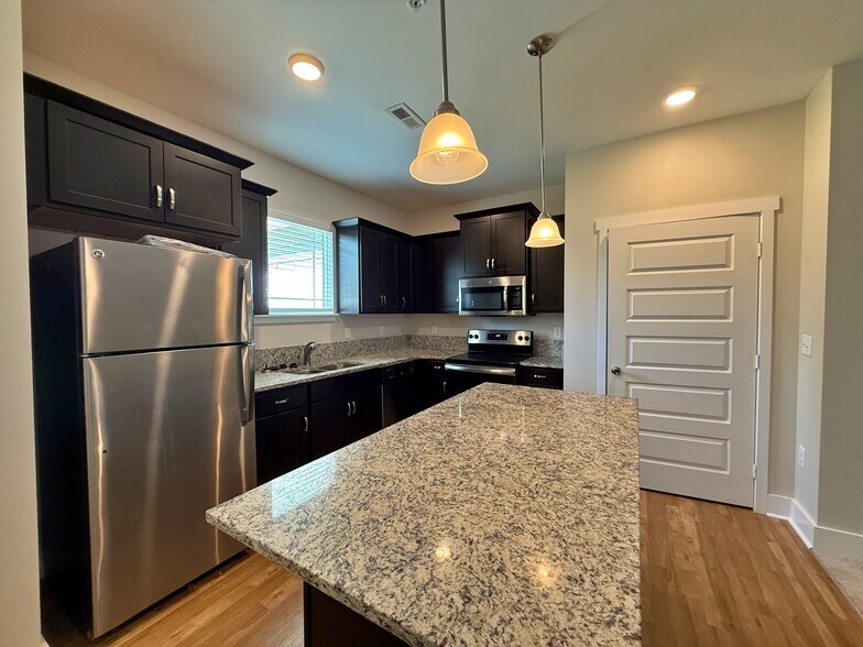 Enjoy the view of your outdoor space from the kitchen sink window. - 3010 Bellflower Cir