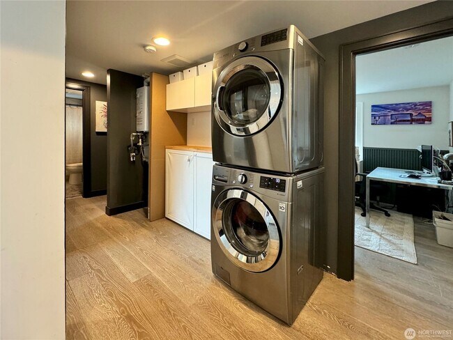 Building Photo - Remodeled 3 bdrm home on a large lot with 500 sq ft wrap around deck!
