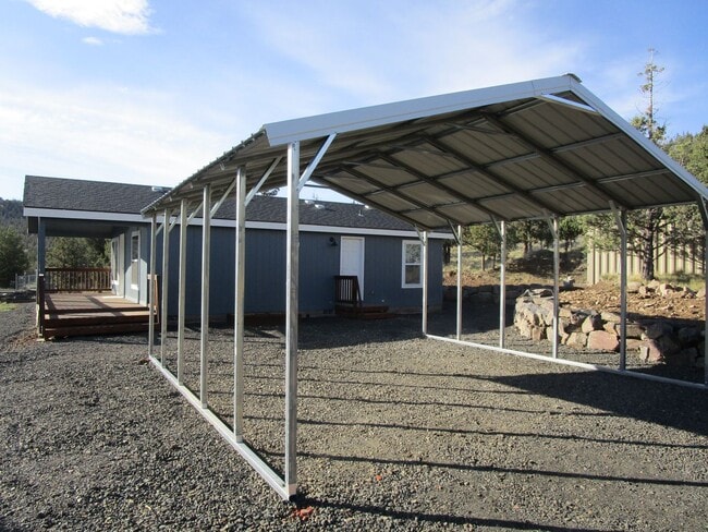 Building Photo - *APPLICATIONS PENDING* Brand New Manufactured Home - Water/Sewer/Electricity Provided!