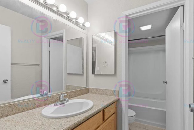 Building Photo - Incredible condo near UNR! This charming 2...