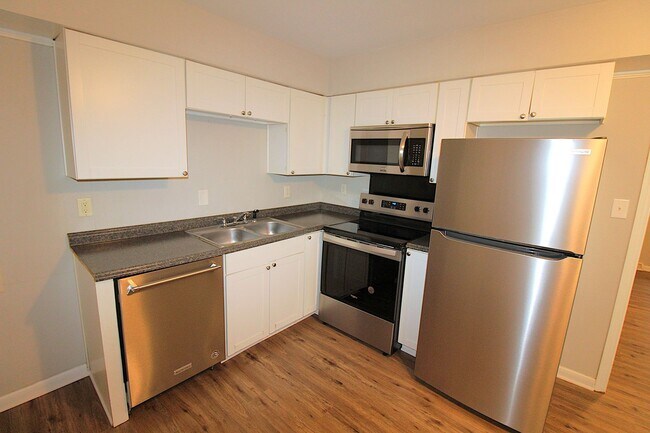 Building Photo - Updated with Modern Finishes!