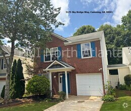 Building Photo - Fenced in Backyard! Bring your PETS!