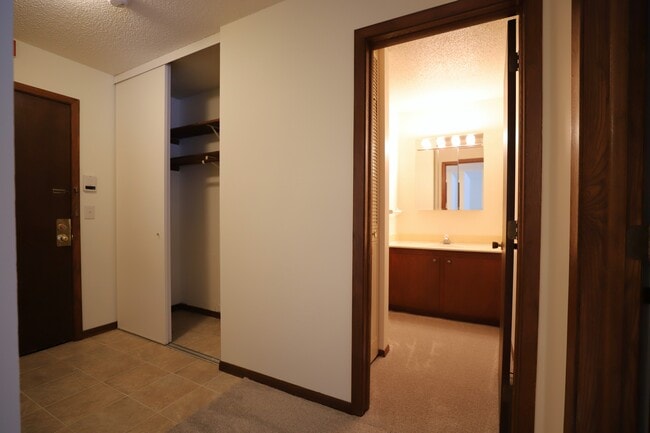 Entry and Bathroom - Chalet Apartments