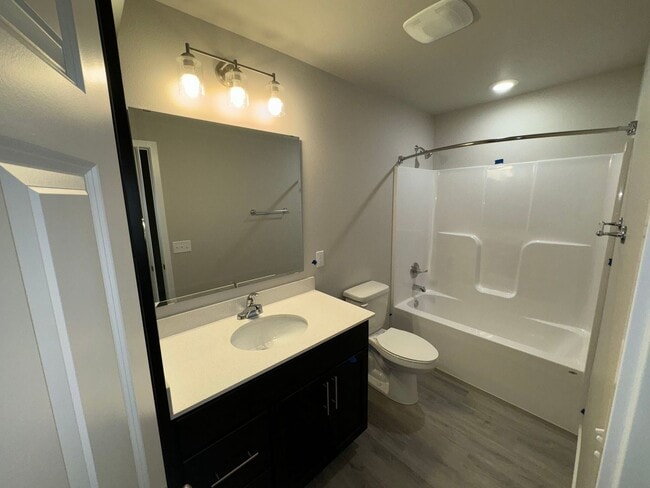 Building Photo - 2 Bed | 2 Bath | 3 Stall Garage | Patio Twin-Home