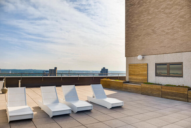 28th floor roof top patio for star gazing or tanning. - 15 S 1st St