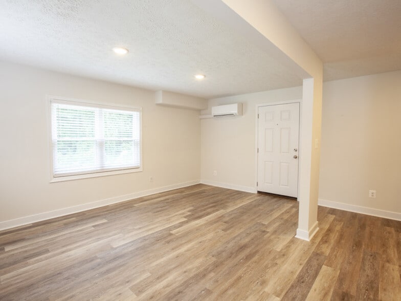 Light filled family room with all new windows and blinds - 612 Rock Creek Road