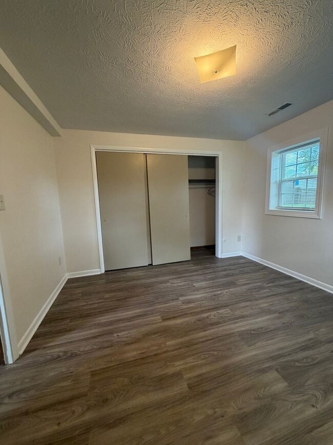Building Photo - One Bedroom Duplex