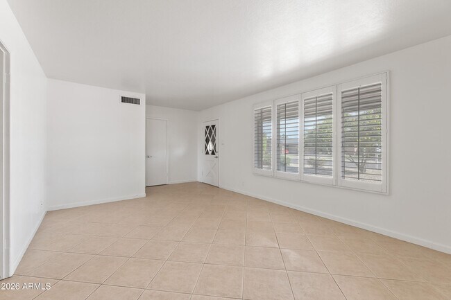 Building Photo - 8520 E Roma Ave