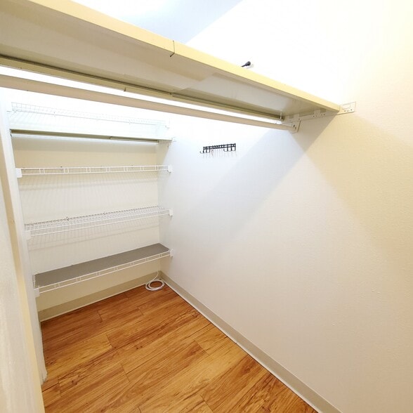 4'x11' closet with wall of shelves - 3161 Madison Ave