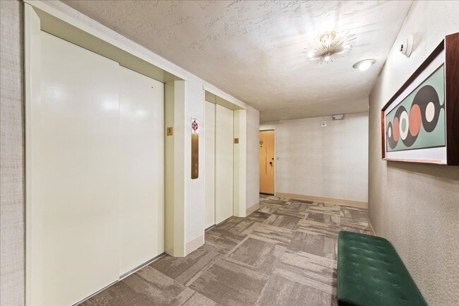 Building Photo - Stylish Imperial Plaza Condo in Prime Downtown Location