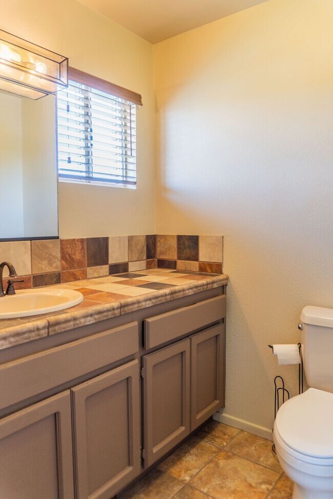 Building Photo - Spacious 3-Bedroom, 4-Bath Vintage Home wi...