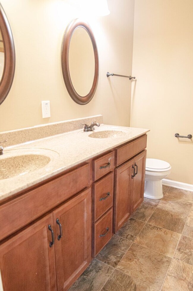 Building Photo - Pet Friendly Three Bedroom with Bonus!