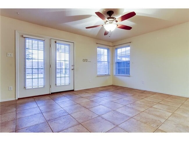 Building Photo - Beautiful single-story home with a front g...