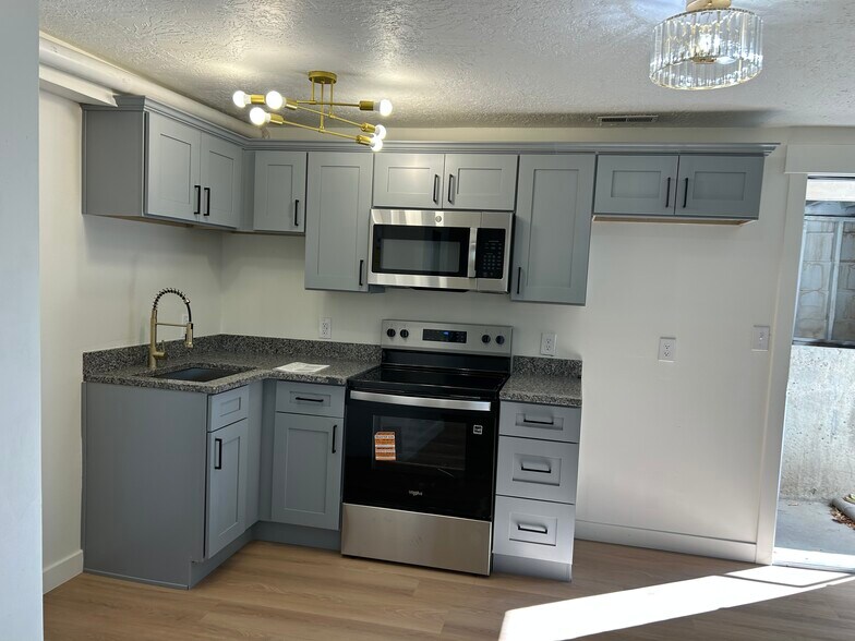 Not on the photo but kitchen comes with fridge and washer and dryer, all brand new appliances - 4171 S 4900 W